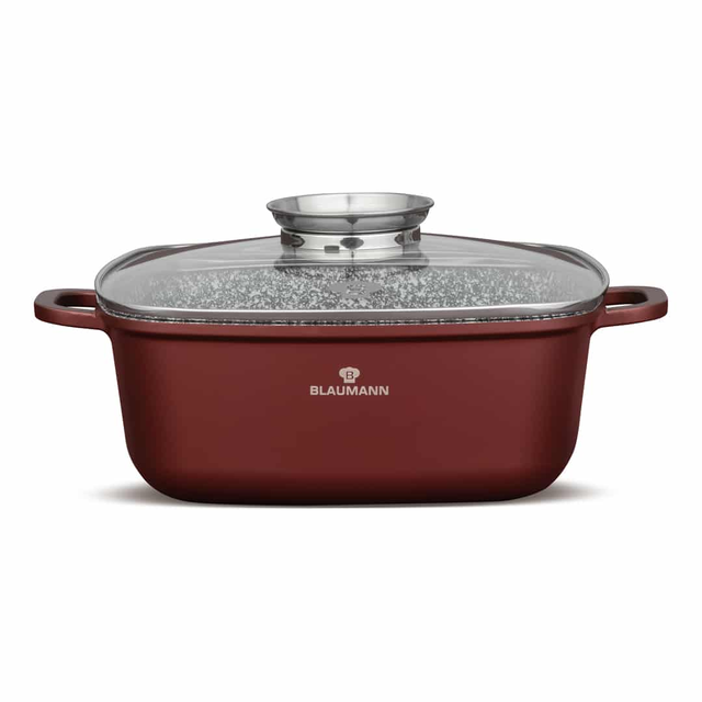 Red cooking pot with glass lid and side handles; Blaumann logo visible on the front.