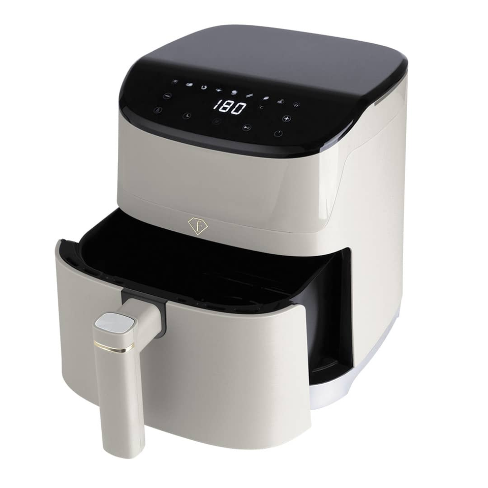 Air fryer with the basket pulled out and the digital display showing 180 degrees on top panel.