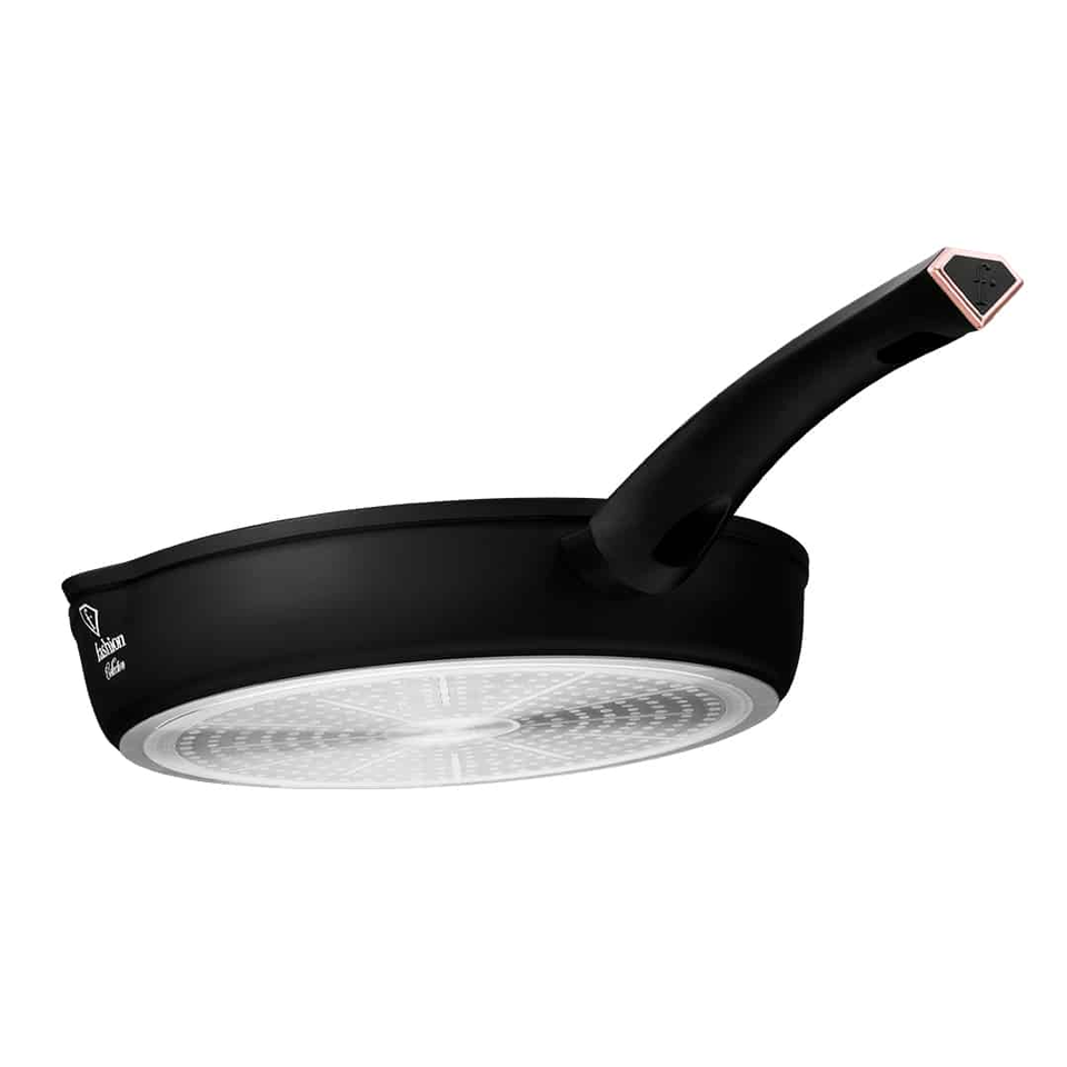 Black round frying pan with a long curved handle ending in a rose‑gold hexagonal grip